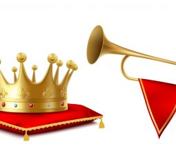 A gold crown on a red cushion, a bugle with a pennant